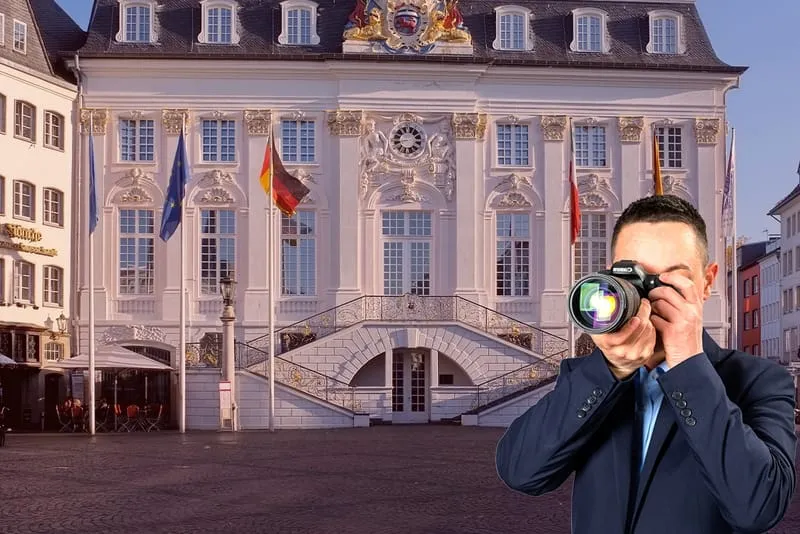 Bundesviertel in Bonn, Detektiv der Detektei fotografiert, Schriftzug: Unsere Detektei ermittelt für Sie in Bonn!