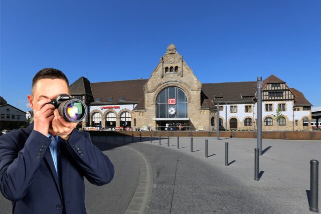 Hauptbahnhof Worms. Der Detektiv der Detektei fotografiert in Worms.